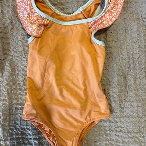 Patagonia Orange Swimsuit with Star Pattern